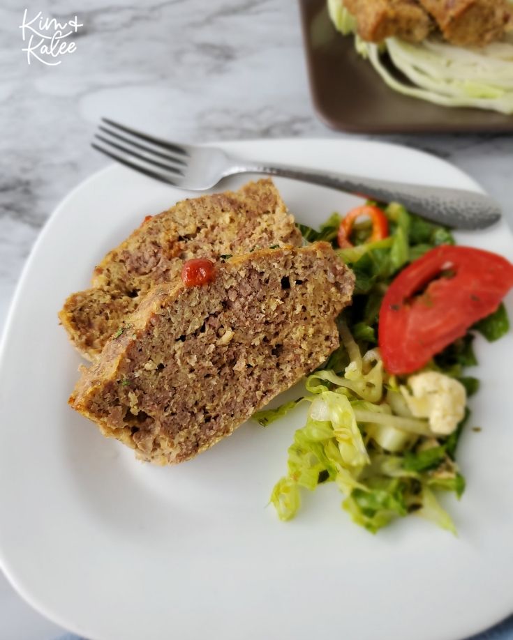 slice of the keto meatloaf with vegetables