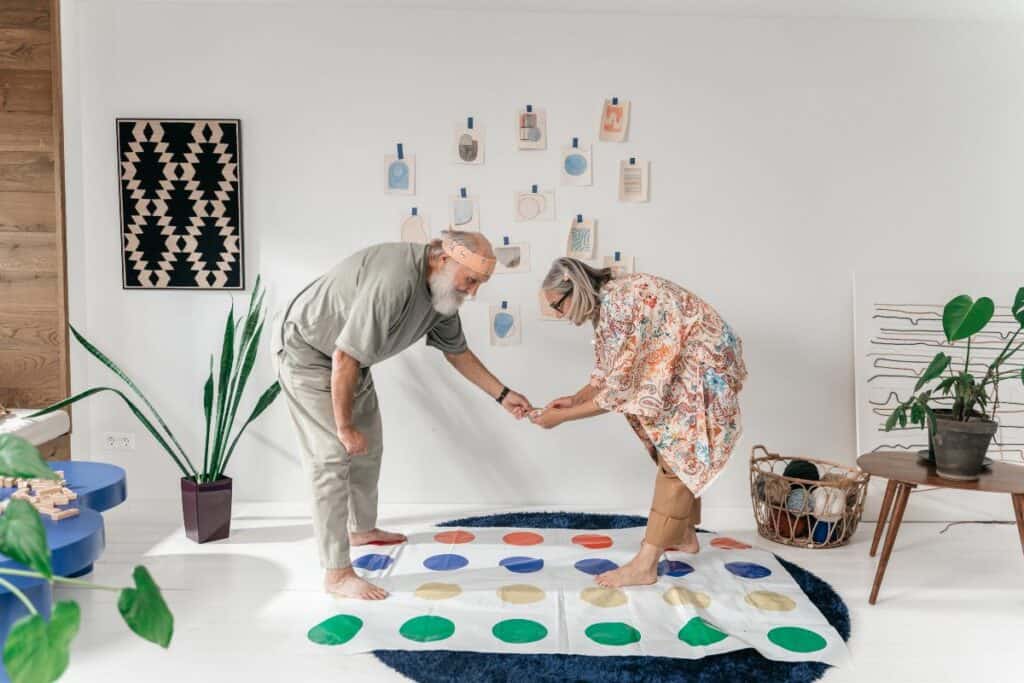 older couple playing twister