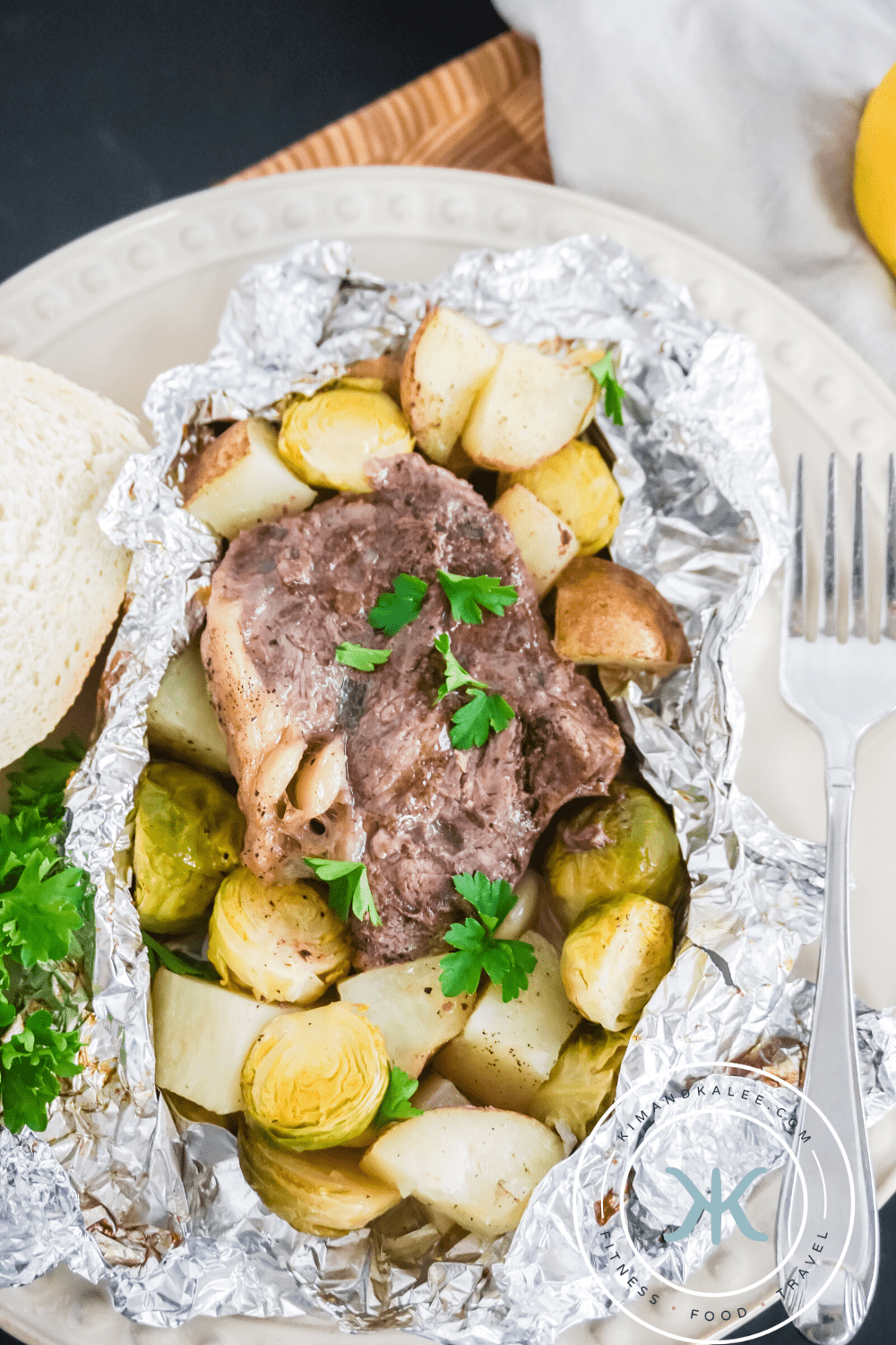 steak, potato and vegetable foil packets in oven