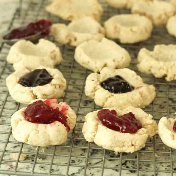 pecan thumbprint cookies recipe topped with icing or jam