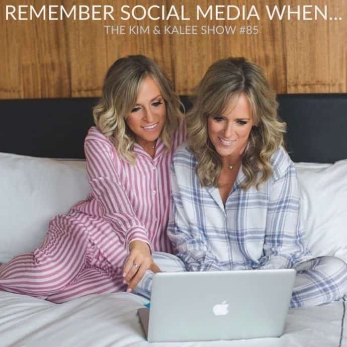 Kalee & Kim sitting on bed playing on computer