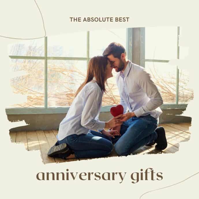 couple on the floor heads together, happy, with the text overlay the absolute best anniversary gifts