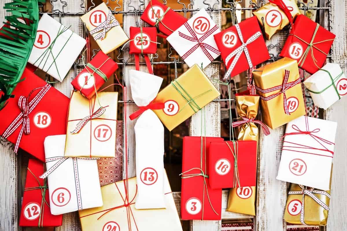 individually wrapped advent calendar filler ideas in red, white, and tan papers