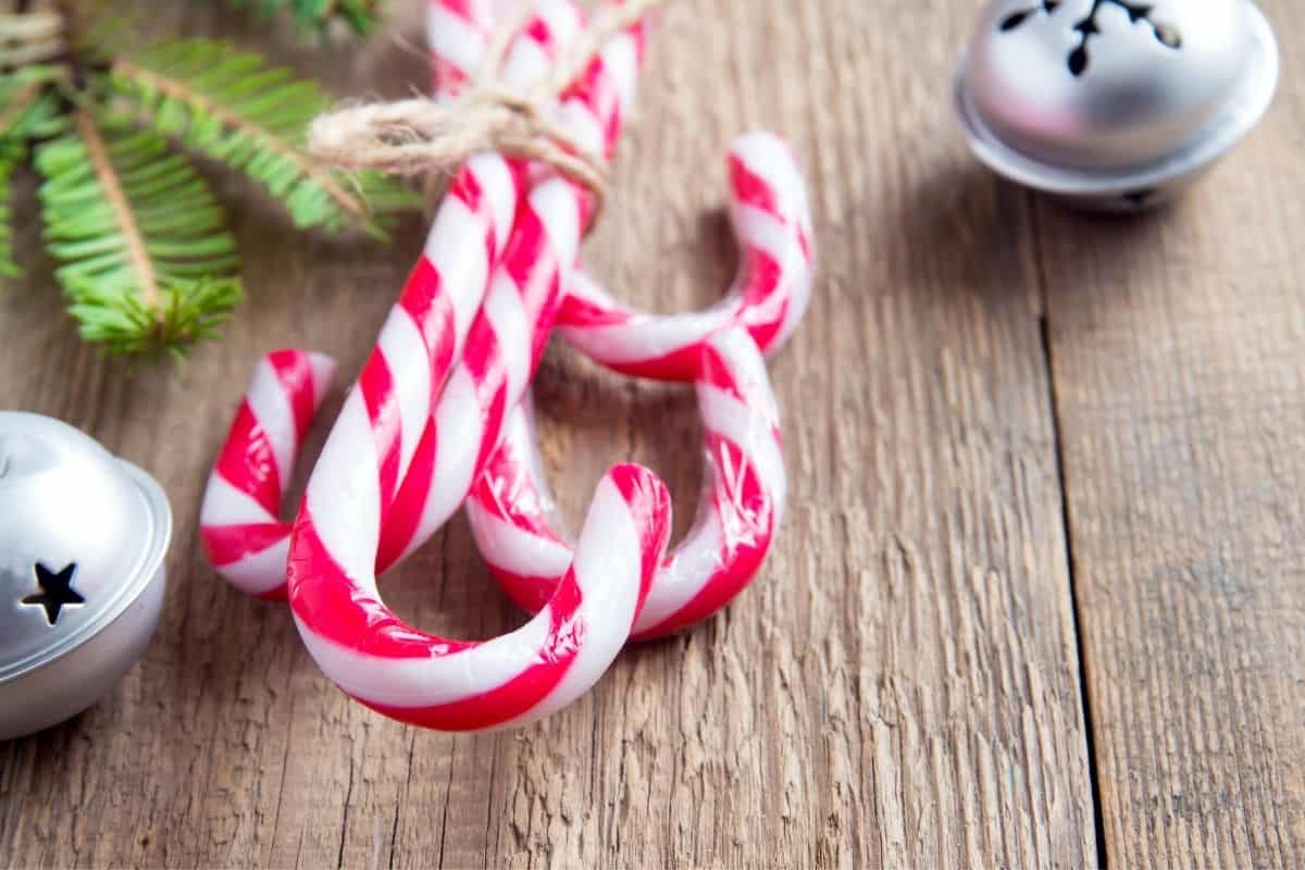 3 candy canes on a table used for advent calendar filler ideas