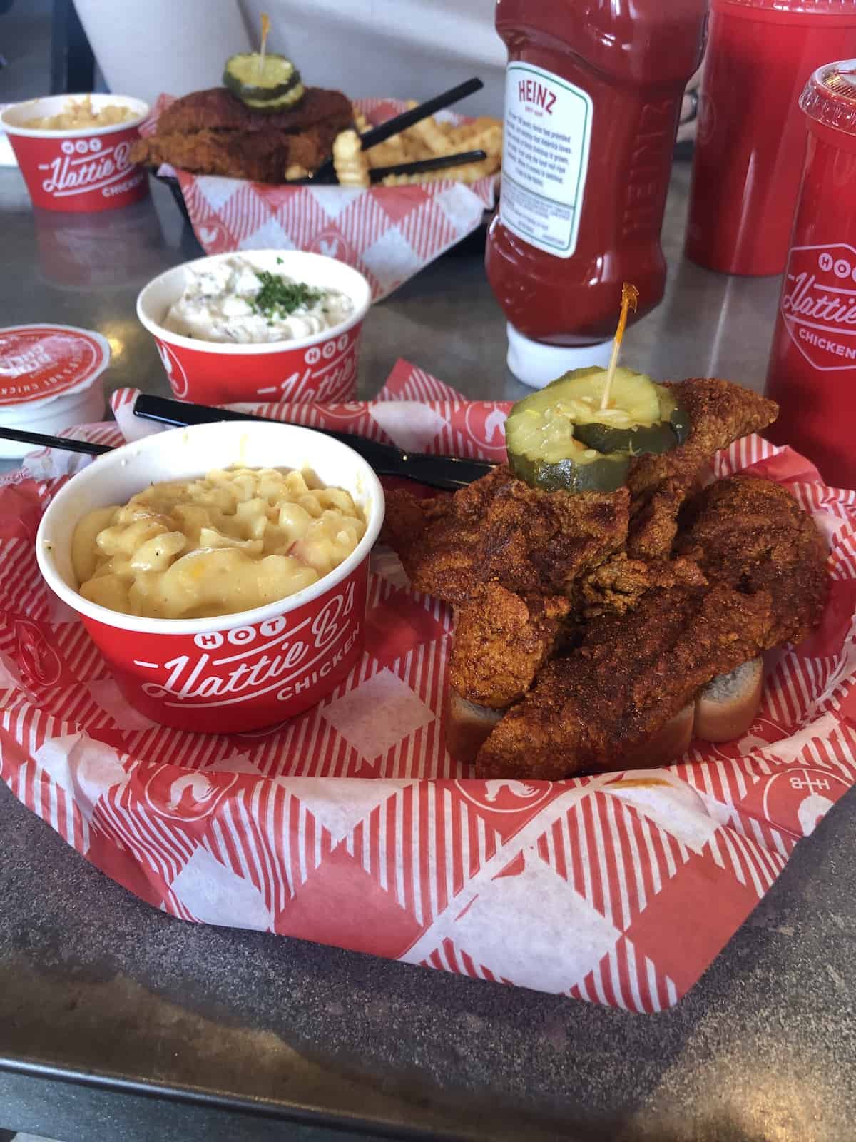 hattie b's hot chicken with potato salad and mac and cheese