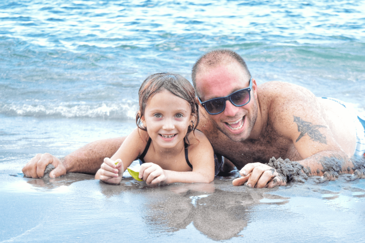 dad and daughter at the beach