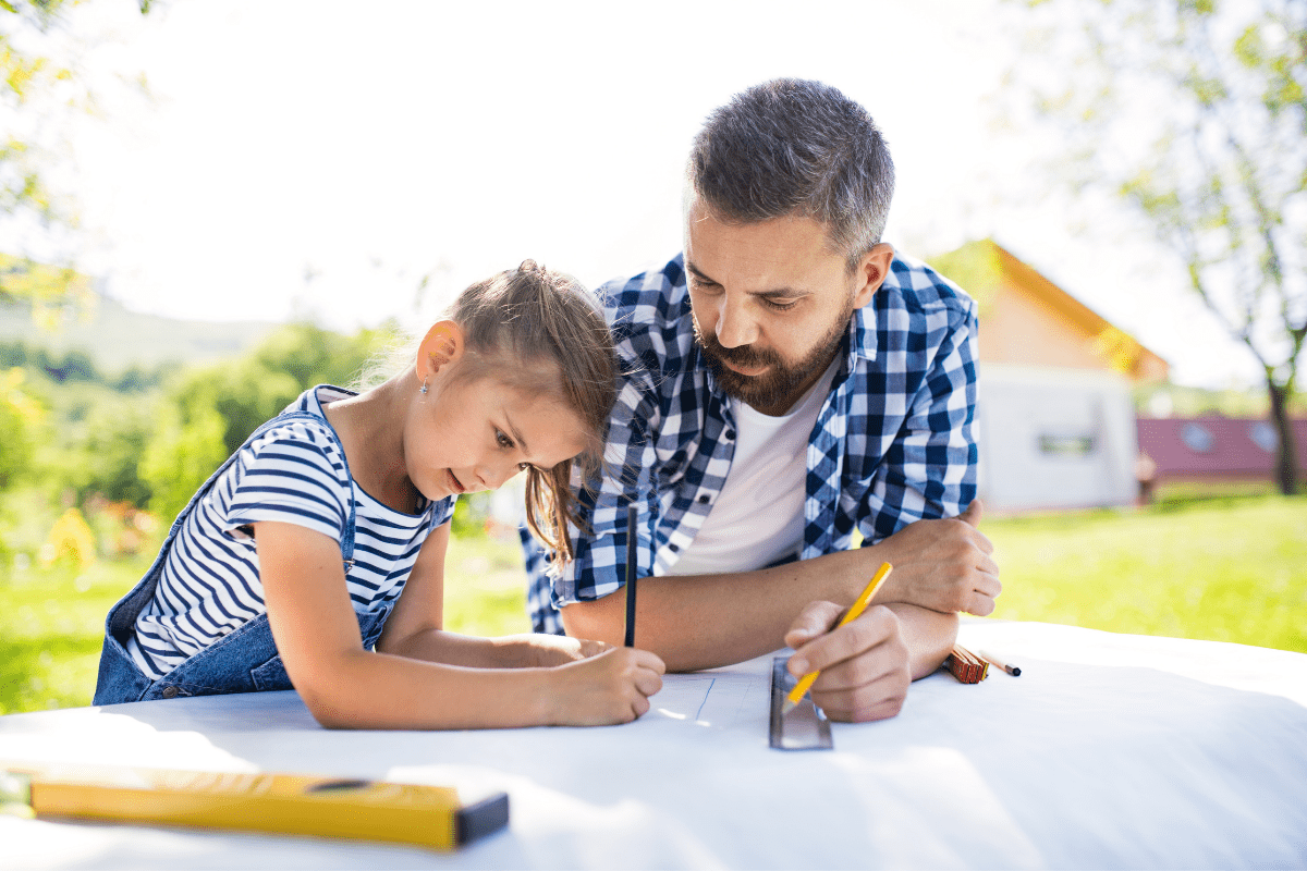 father building something with his daughter