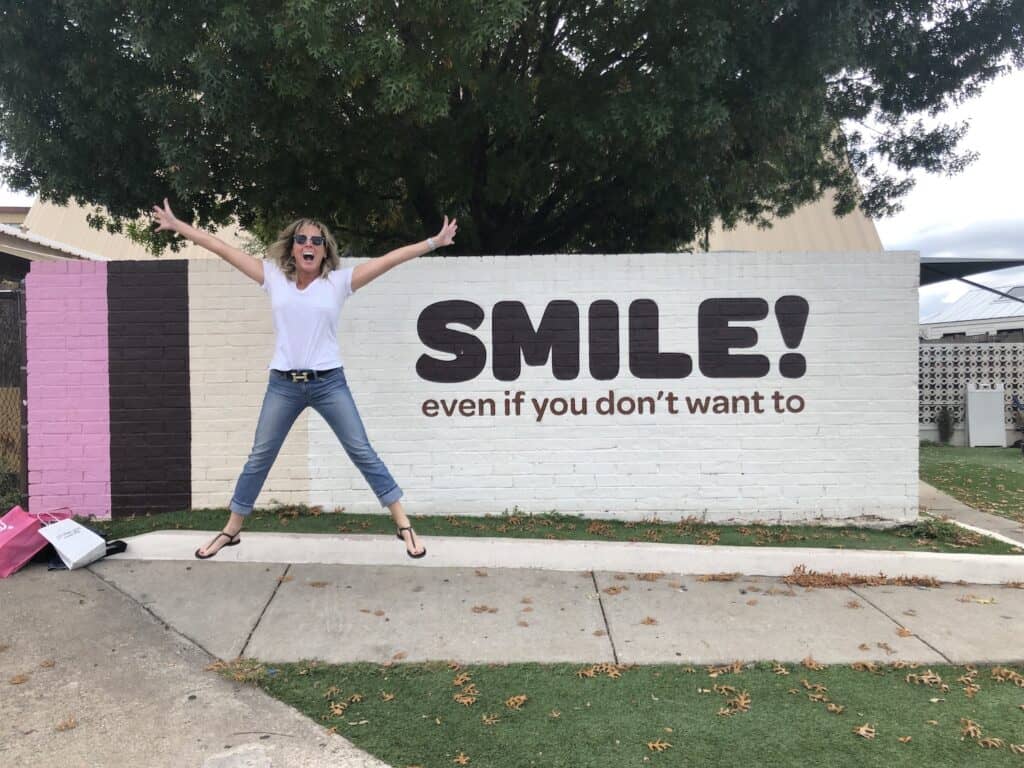 Kim at the Smile mural in Austin Tx