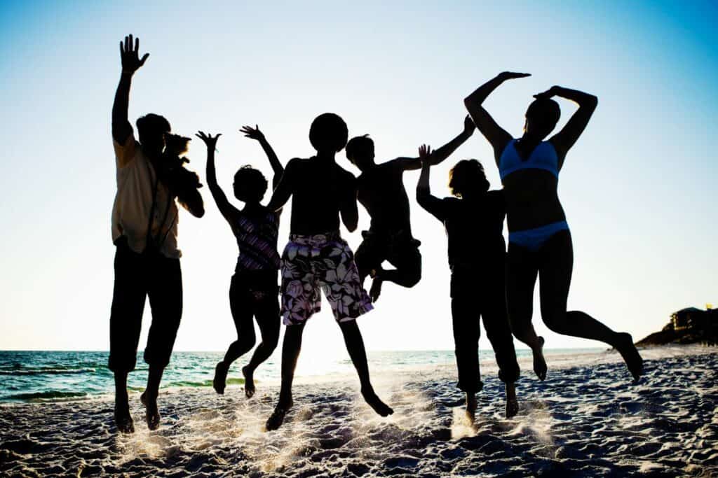 group of teens on a birthday trip to the beach