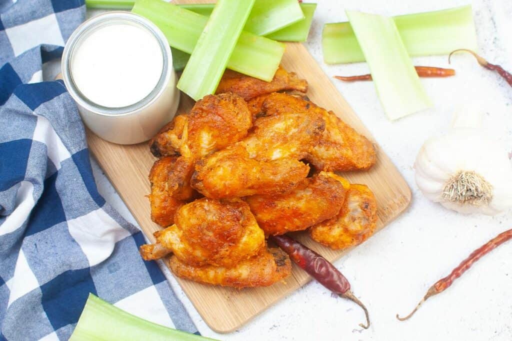 buffalo air fryer chicken wings with ranch and celery sticks