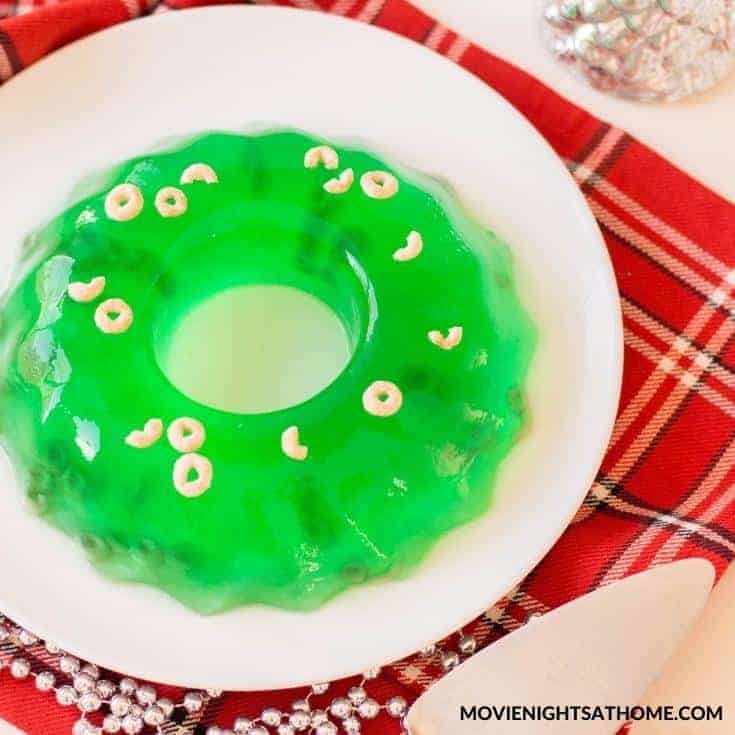 green jello mold with cheerios on top