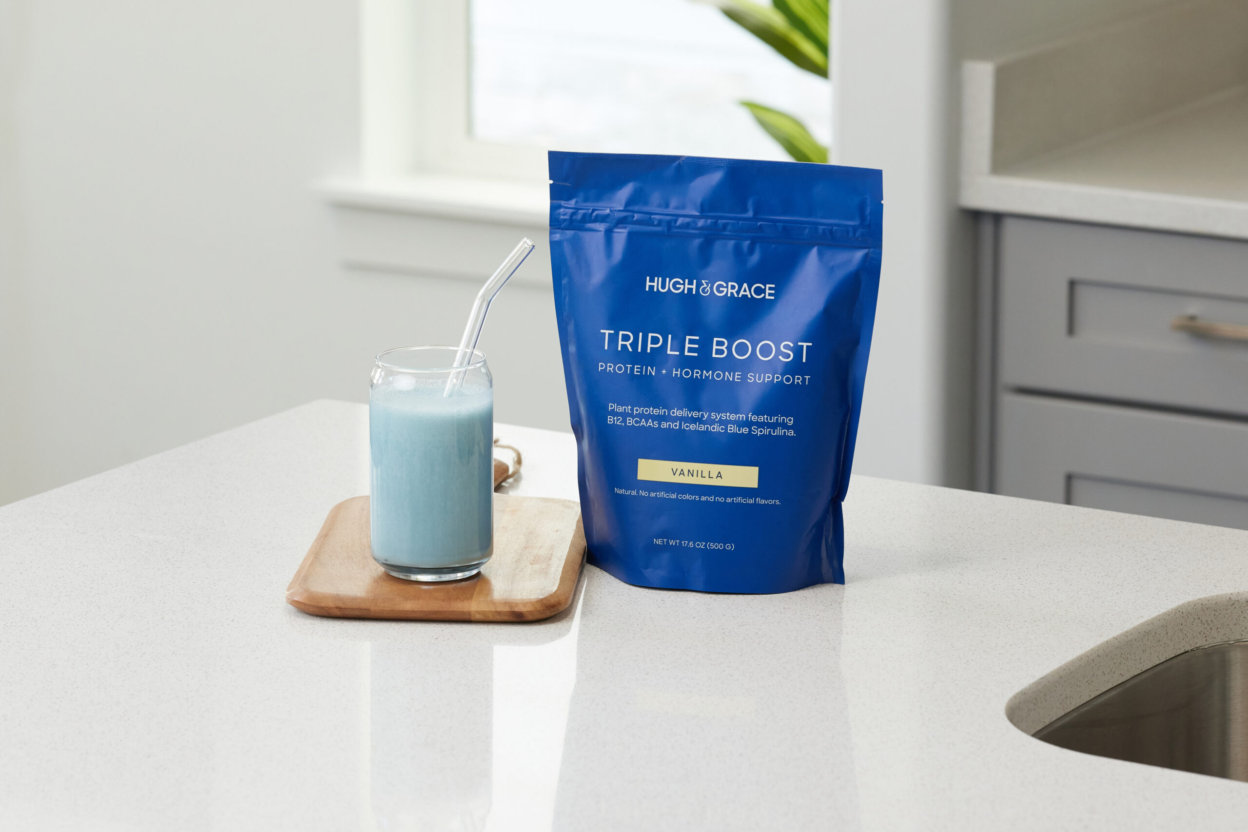 hugh and grace triple boost protein in a glass